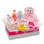 Pink box of girl baby items