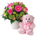 Pink Floral arrangement with teddy bear