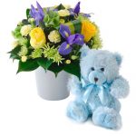 Blue Floral arrangement with teddy bear