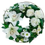 Green and white cluster wreath suitable for service.
